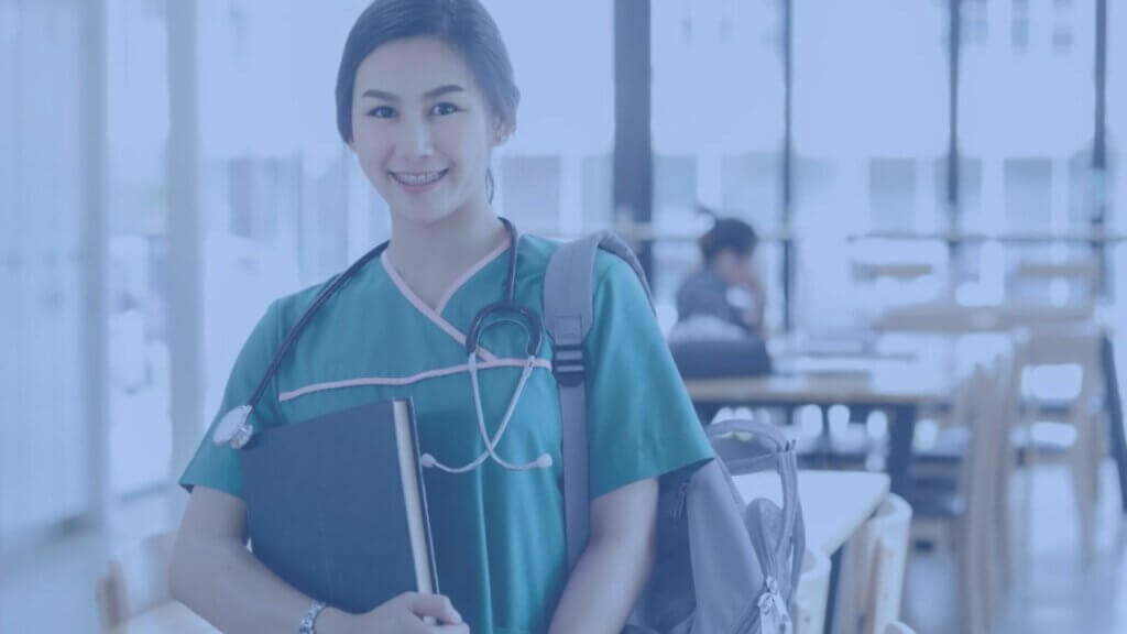 Asian student of medicine in library.