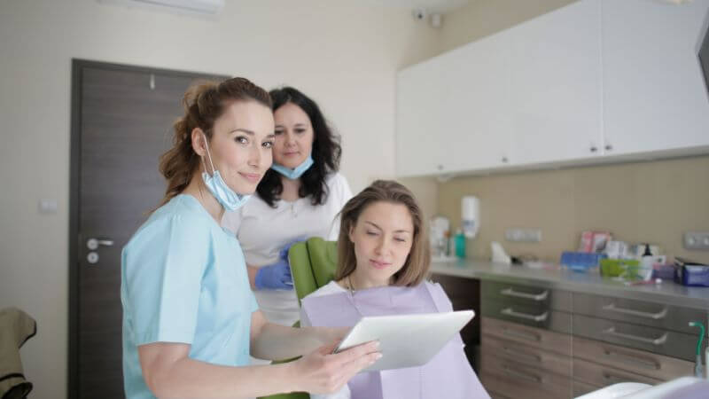 patient engaging over a tablet in a clean.