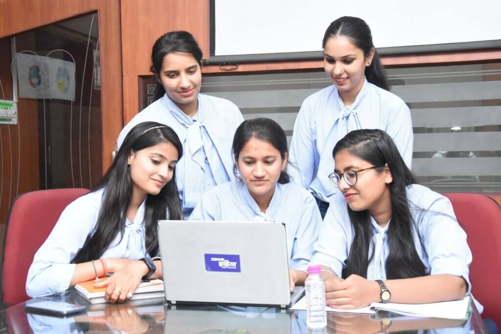 Indian nursing student reviewing NCLEX pharmacology notes and medication safety questions